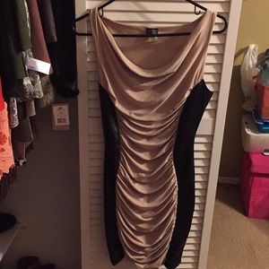 Nice beige and black “leather” on the side Dress.